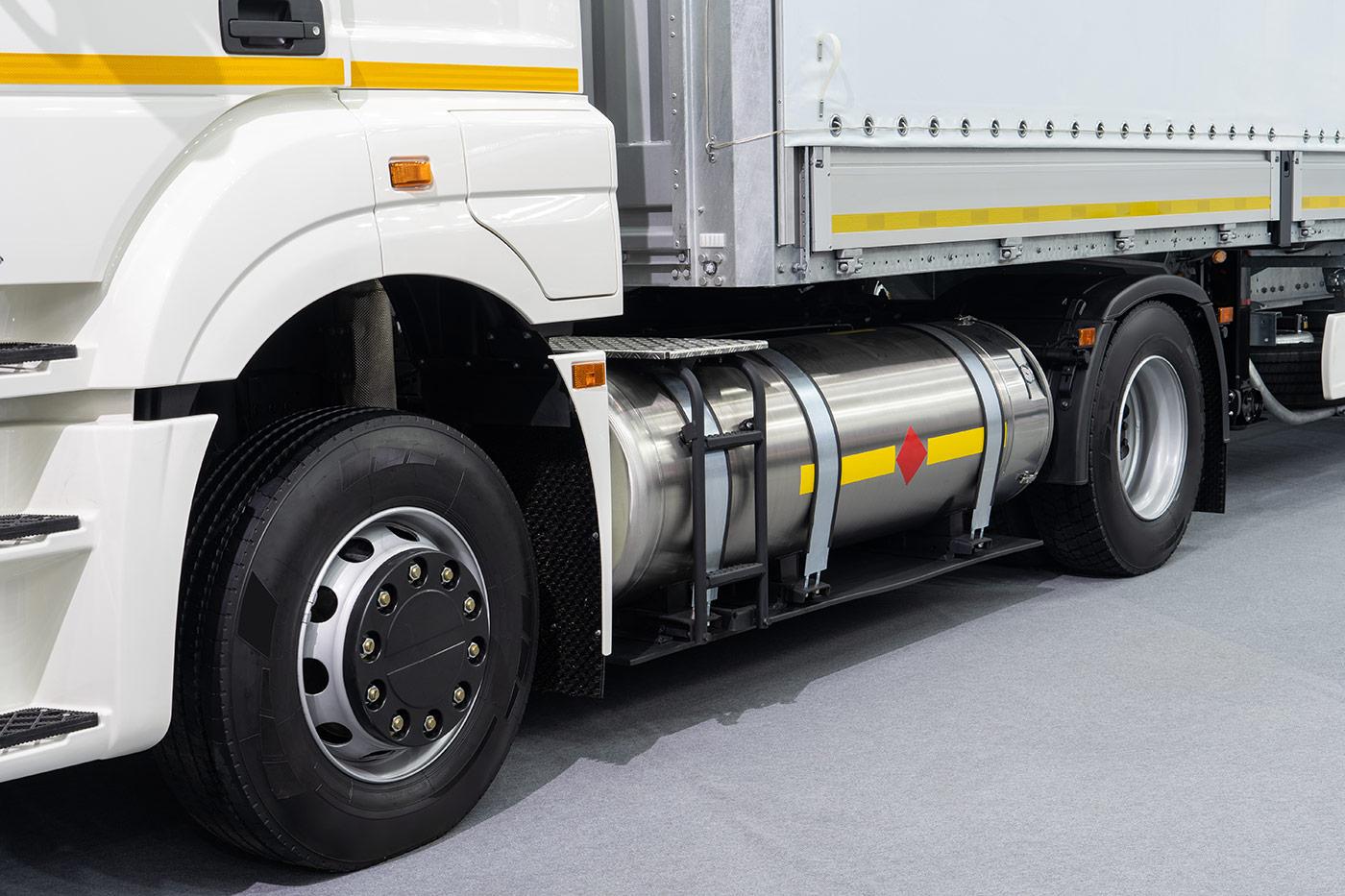 High-pressure gas cylinder mounted on a commercial truck, illustrating DOT-SP recertification for safe transport and storage compliance.